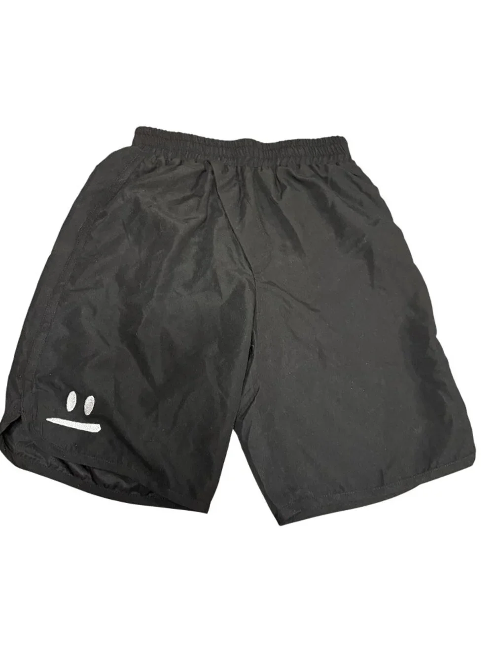 nununu Smirk Surf Shorts in Black